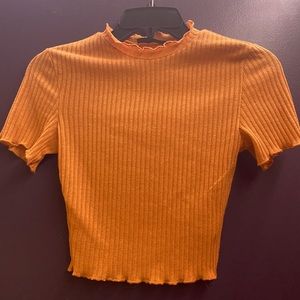 dark yellow tight fitting top